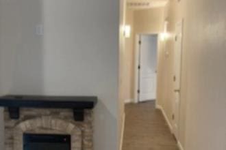 9872 N Woodrow Ave, Fresno, CA 93720 - corridor featuring baseboards