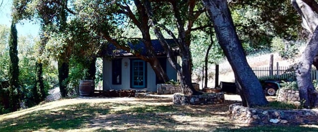 33491 Rd 233, North Fork, CA 93643 - view of property hidden behind natural elements featuring stucco siding