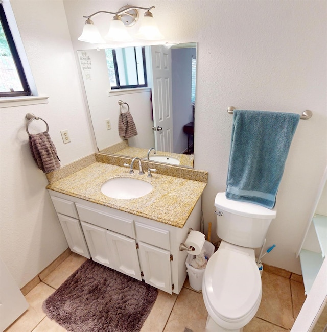 33491 Rd 233, North Fork, CA 93643 - bathroom with vanity, healthy amount of natural light, and tile patterned flooring