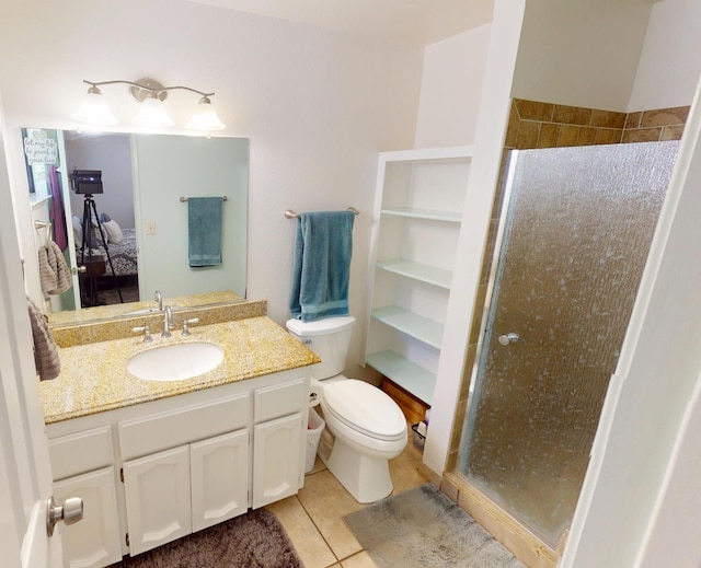 33491 Rd 233, North Fork, CA 93643 - bathroom featuring a shower stall, vanity, toilet, and tile patterned flooring