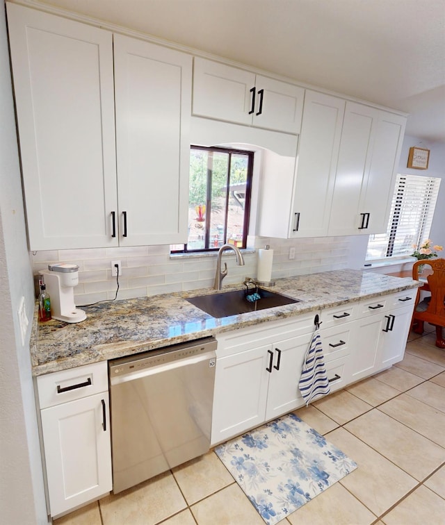 33491 Rd 233, North Fork, CA 93643 - kitchen with dishwasher, decorative backsplash, and white cabinets