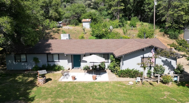 33491 Rd 233, North Fork, CA 93643 - view of front of home with a patio and a front lawn