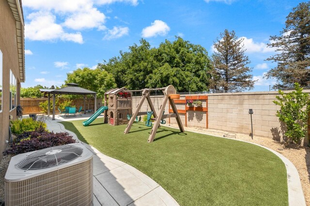 3771 Wrenwood Ave, Clovis, CA 93619 - view of yard featuring central AC, a playground, a gazebo, and a patio