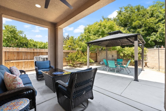 3771 Wrenwood Ave, Clovis, CA 93619 - fenced backyard with an outdoor hangout area, a patio, a gazebo, outdoor dining space, and a ceiling fan