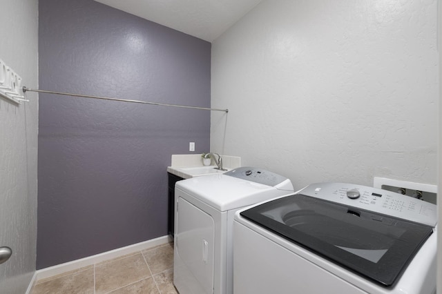 3771 Wrenwood Ave, Clovis, CA 93619 - laundry room with washing machine and clothes dryer and baseboards
