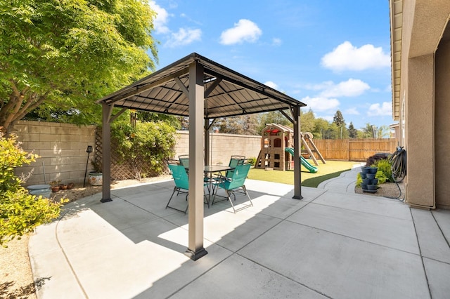 3771 Wrenwood Ave, Clovis, CA 93619 - fenced backyard featuring a patio area, outdoor dining space, a playground, and a gazebo