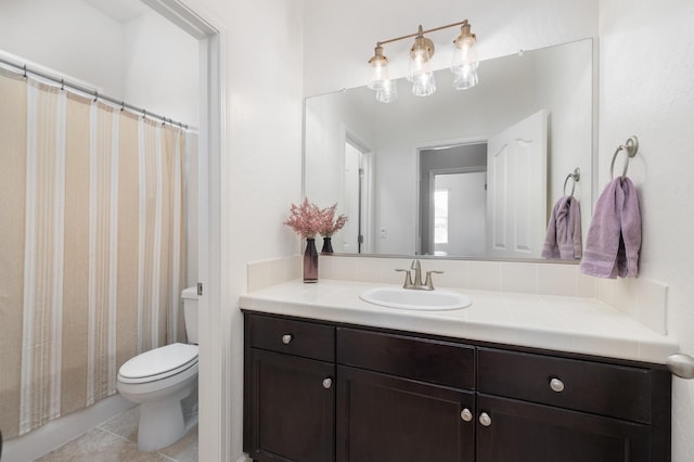3771 Wrenwood Ave, Clovis, CA 93619 - full bath featuring toilet, vanity, tile patterned floors, and a shower with shower curtain