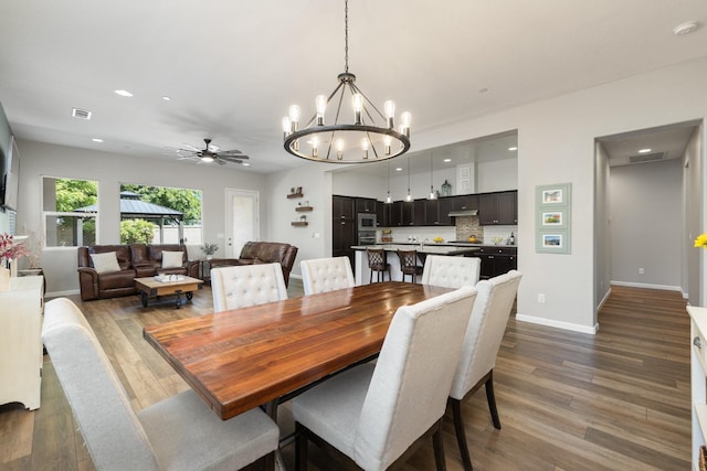 3771 Wrenwood Ave, Clovis, CA 93619 - dining area featuring a chandelier, recessed lighting, dark wood-style floors, baseboards, and ceiling fan