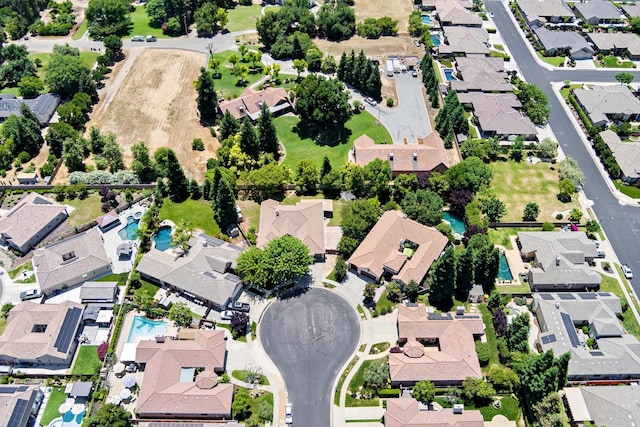 1413 N Hornet Ave, Clovis, CA 93619 - aerial overview of property's location featuring nearby suburban area and a pool