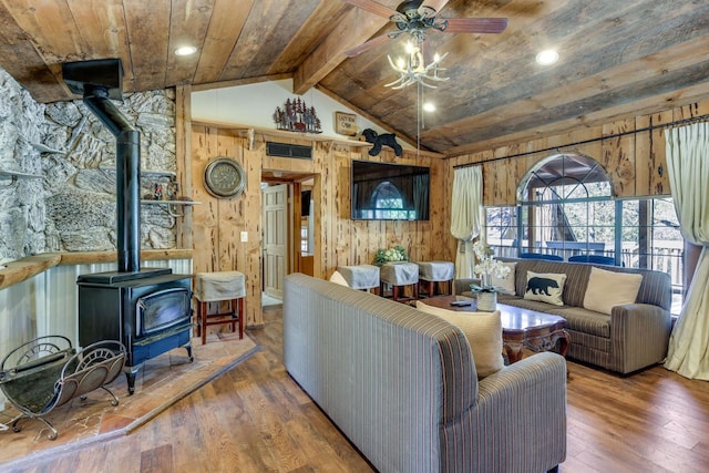 35859 Rd 222, Wishon, CA 93669 - living room with a wood stove, a ceiling fan, wooden ceiling, hardwood / wood-style floors, and wood walls
