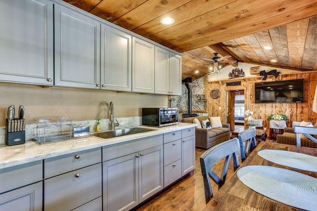 35859 Rd 222, Wishon, CA 93669 - kitchen with stainless steel microwave, open floor plan, a sink, wood ceiling, and dark wood-type flooring