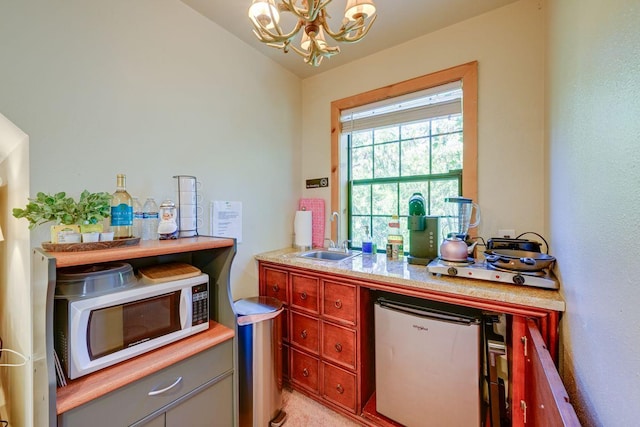 35859 Rd 222, Wishon, CA 93669 - bar area featuring a sink, white microwave, fridge, and a chandelier