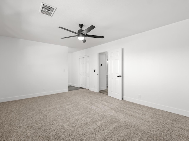 829 Polson Ave, Clovis, CA 93612 - empty room with a ceiling fan, carpet flooring, and baseboards