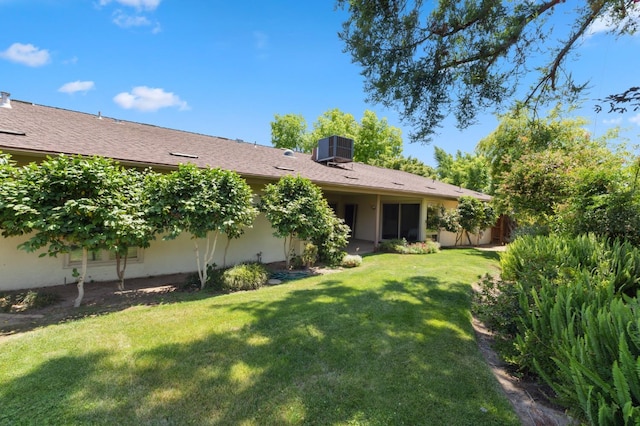 3244 W Fremont Ave, Fresno, CA 93711 - view of green lawn featuring central AC
