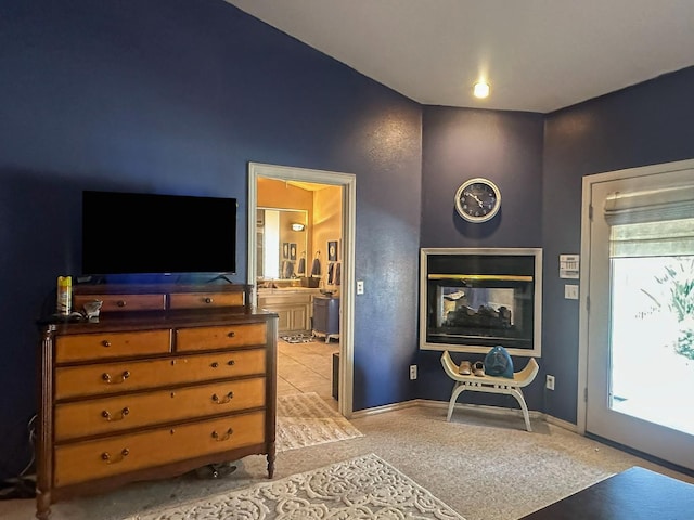 3055 Glenville Ave, Madera, CA 93637 - bedroom featuring ensuite bathroom, light colored carpet, and baseboards
