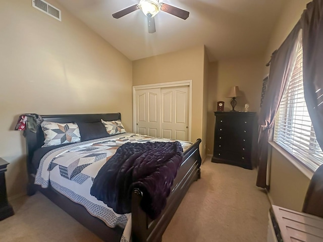3055 Glenville Ave, Madera, CA 93637 - bedroom with light colored carpet, a closet, and a ceiling fan
