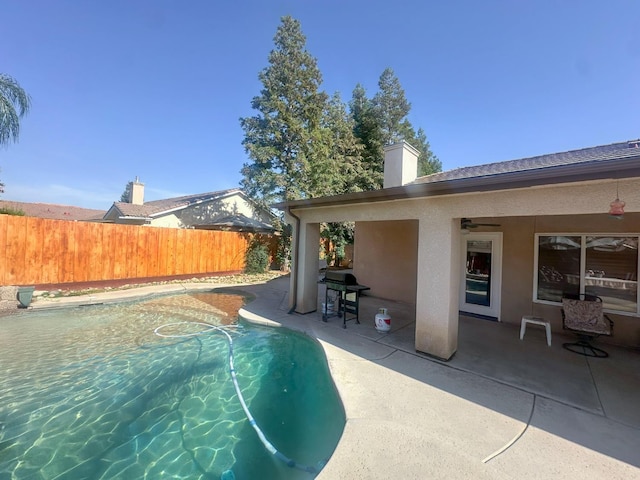 3055 Glenville Ave, Madera, CA 93637 - view of swimming pool with a patio and a grill