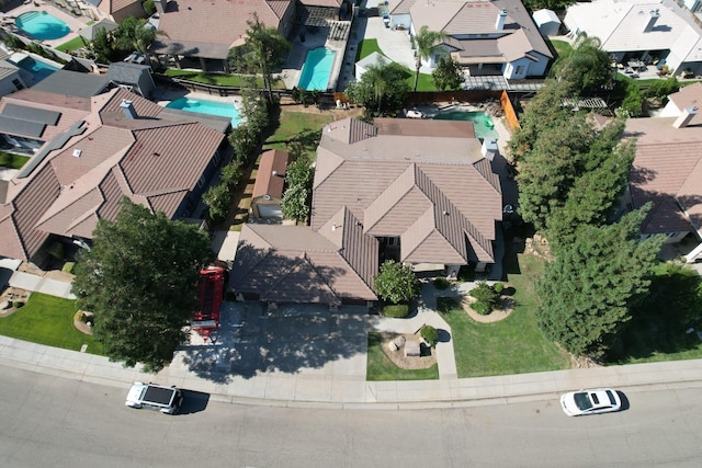 3055 Glenville Ave, Madera, CA 93637 - aerial overview of property's location with nearby suburban area and a pool