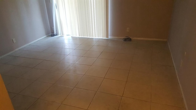 455 S Coalinga St, Coalinga, CA 9342 - tiled empty room featuring baseboards