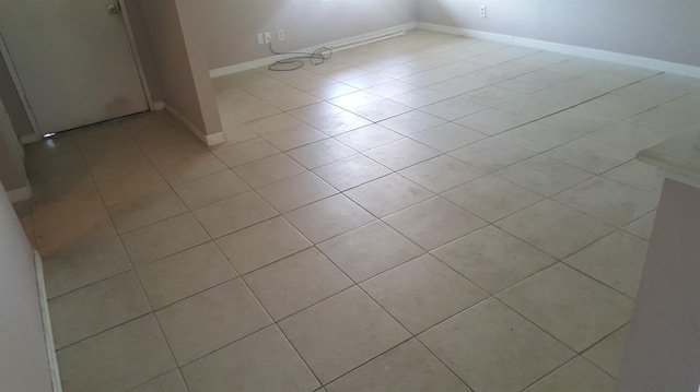 455 S Coalinga St, Coalinga, CA 9342 - unfurnished room featuring light tile patterned flooring and baseboards