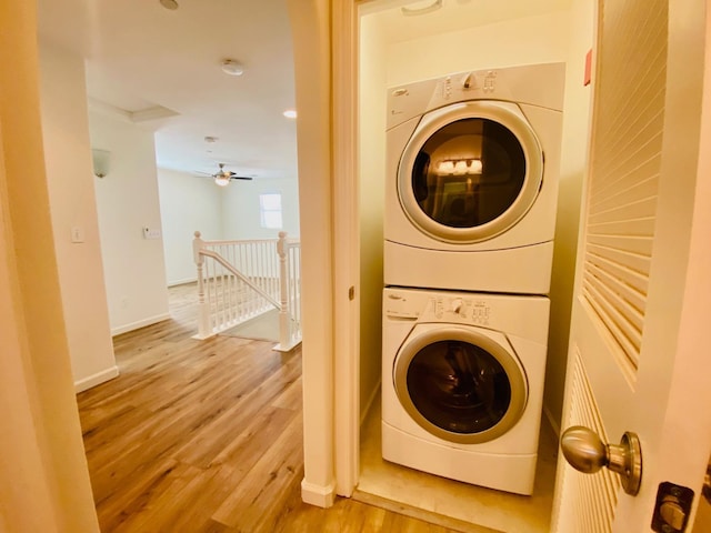 1507 N Strada Way, Clovis, CA 93619 - laundry room with stacked washer / drying machine, wood finished floors, baseboards, and a ceiling fan