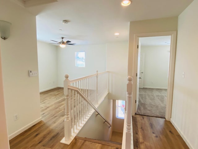 1507 N Strada Way, Clovis, CA 93619 - hallway with an upstairs landing, wood finished floors, baseboards, and recessed lighting