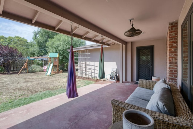 136 E Simpson Ave, Fresno, CA 93704 - fenced backyard with a playground and a patio