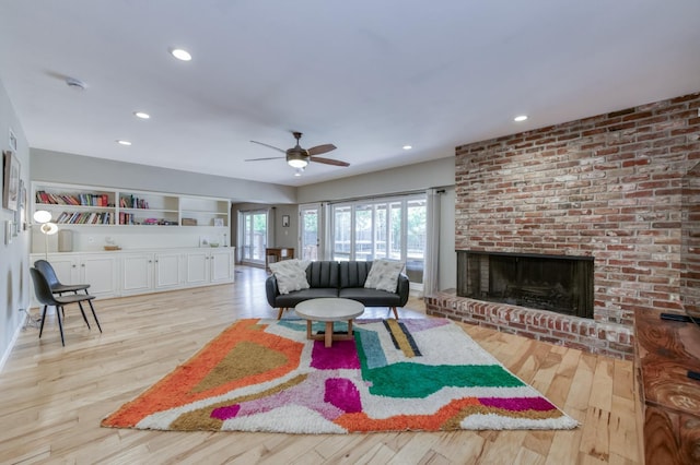 136 E Simpson Ave, Fresno, CA 93704 - living area featuring a fireplace, light wood finished floors, a ceiling fan, and recessed lighting