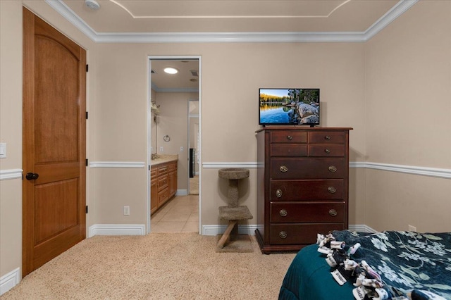 2707 W Menlo Ave, Fresno, CA 93711 - bedroom featuring light carpet, crown molding, ensuite bathroom, and light tile patterned flooring