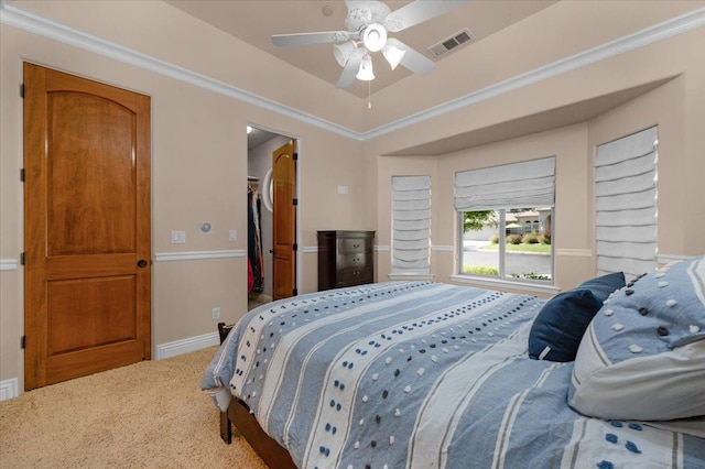 2707 W Menlo Ave, Fresno, CA 93711 - bedroom featuring a spacious closet, crown molding, ceiling fan, and carpet floors