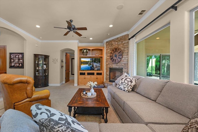 2707 W Menlo Ave, Fresno, CA 93711 - living area featuring arched walkways, carpet floors, ornamental molding, a ceiling fan, and recessed lighting