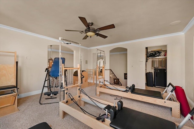 2707 W Menlo Ave, Fresno, CA 93711 - exercise room featuring crown molding, a ceiling fan, carpet, and arched walkways