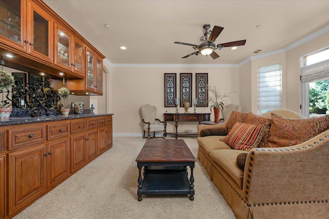 2707 W Menlo Ave, Fresno, CA 93711 - living area featuring light colored carpet, ornamental molding, ceiling fan, and recessed lighting