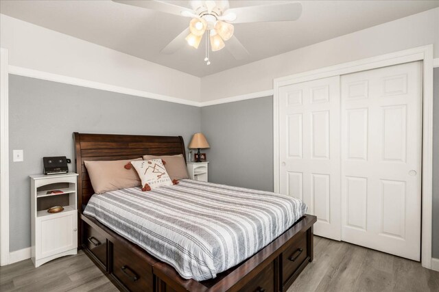30015 Stetson Dr, Coarsegold, CA 93614 - bedroom featuring light wood-style floors, a closet, ceiling fan, and baseboards