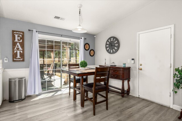 30015 Stetson Dr, Coarsegold, CA 93614 - dining area featuring light wood-style flooring and a wainscoted wall