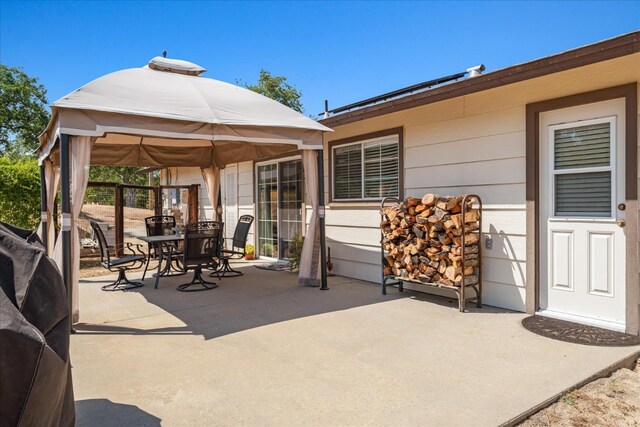 30015 Stetson Dr, Coarsegold, CA 93614 - view of patio / terrace featuring outdoor dining space and a gazebo