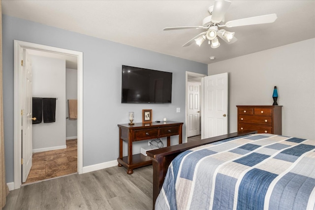 30015 Stetson Dr, Coarsegold, CA 93614 - bedroom featuring light wood finished floors, baseboards, and ceiling fan