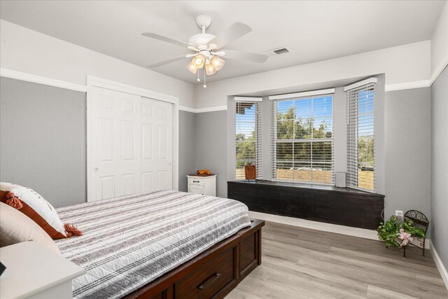 30015 Stetson Dr, Coarsegold, CA 93614 - bedroom featuring light wood-style floors, a closet, a ceiling fan, and baseboards