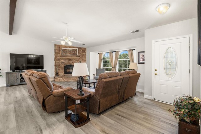 30015 Stetson Dr, Coarsegold, CA 93614 - living room featuring light wood-type flooring, a ceiling fan, a fireplace, baseboards, and vaulted ceiling