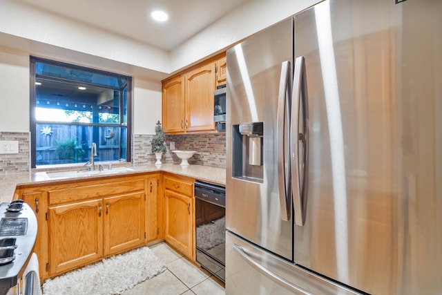 4633 N Glenn Ave, Fresno, CA 93704 - kitchen featuring stainless steel refrigerator with ice dispenser, a sink, black dishwasher, and tasteful backsplash