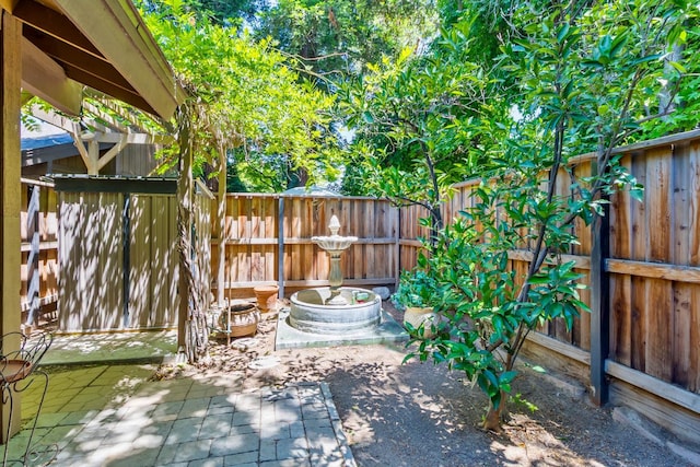 4633 N Glenn Ave, Fresno, CA 93704 - fenced backyard with a patio area