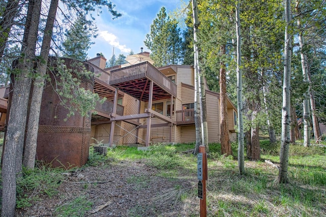 62681 Huntington Vista Ln # 111, Lakeshore, CA 93634 - back of house featuring a chimney and a wooden deck