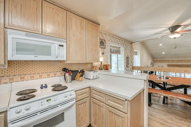 62681 Huntington Vista Ln # 111, Lakeshore, CA 93634 - kitchen featuring white appliances, light brown cabinetry, and a peninsula