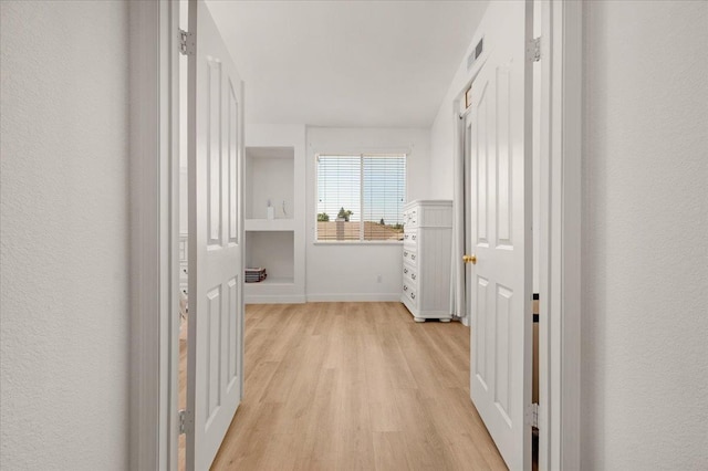 2162 Decatur Ave, Clovis, CA 93611 - hall featuring light wood-style flooring and baseboards