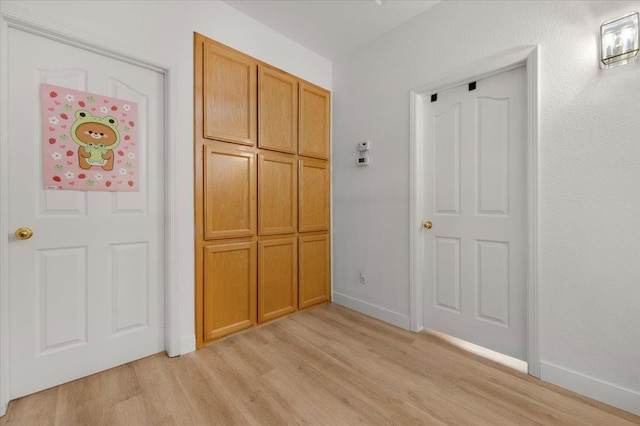 2162 Decatur Ave, Clovis, CA 93611 - unfurnished bedroom with light wood-style floors and baseboards