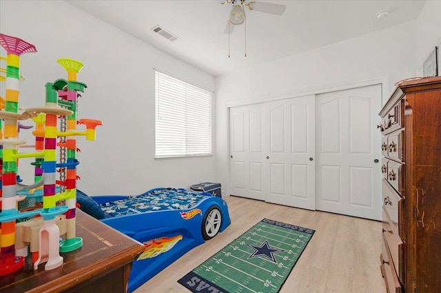 2162 Decatur Ave, Clovis, CA 93611 - bedroom with wood finished floors, a closet, and ceiling fan