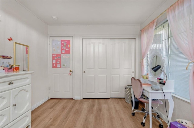 2162 Decatur Ave, Clovis, CA 93611 - home office with light wood-type flooring, ornamental molding, and baseboards