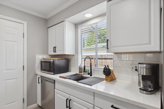 1583 San Gabriel Ave, Clovis, CA 93611 - kitchen with dishwasher, a sink, white cabinets, decorative backsplash, and ornamental molding
