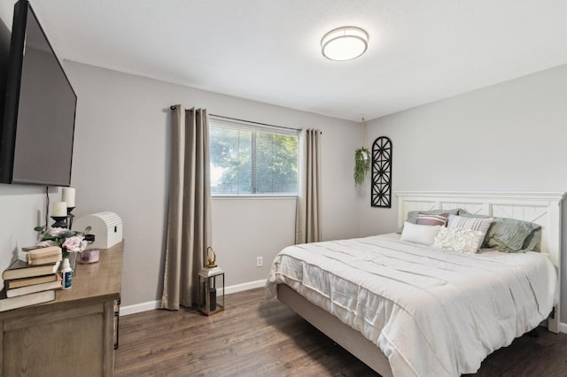 1583 San Gabriel Ave, Clovis, CA 93611 - bedroom with dark wood finished floors and baseboards