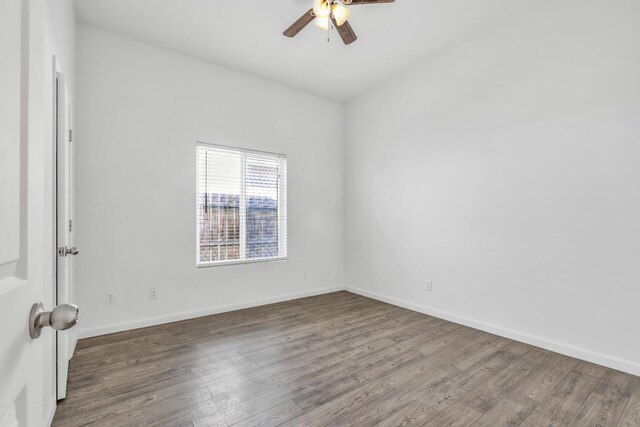 6674 E Alta Ave, Fresno, CA 93727 - spare room featuring ceiling fan, wood finished floors, and baseboards
